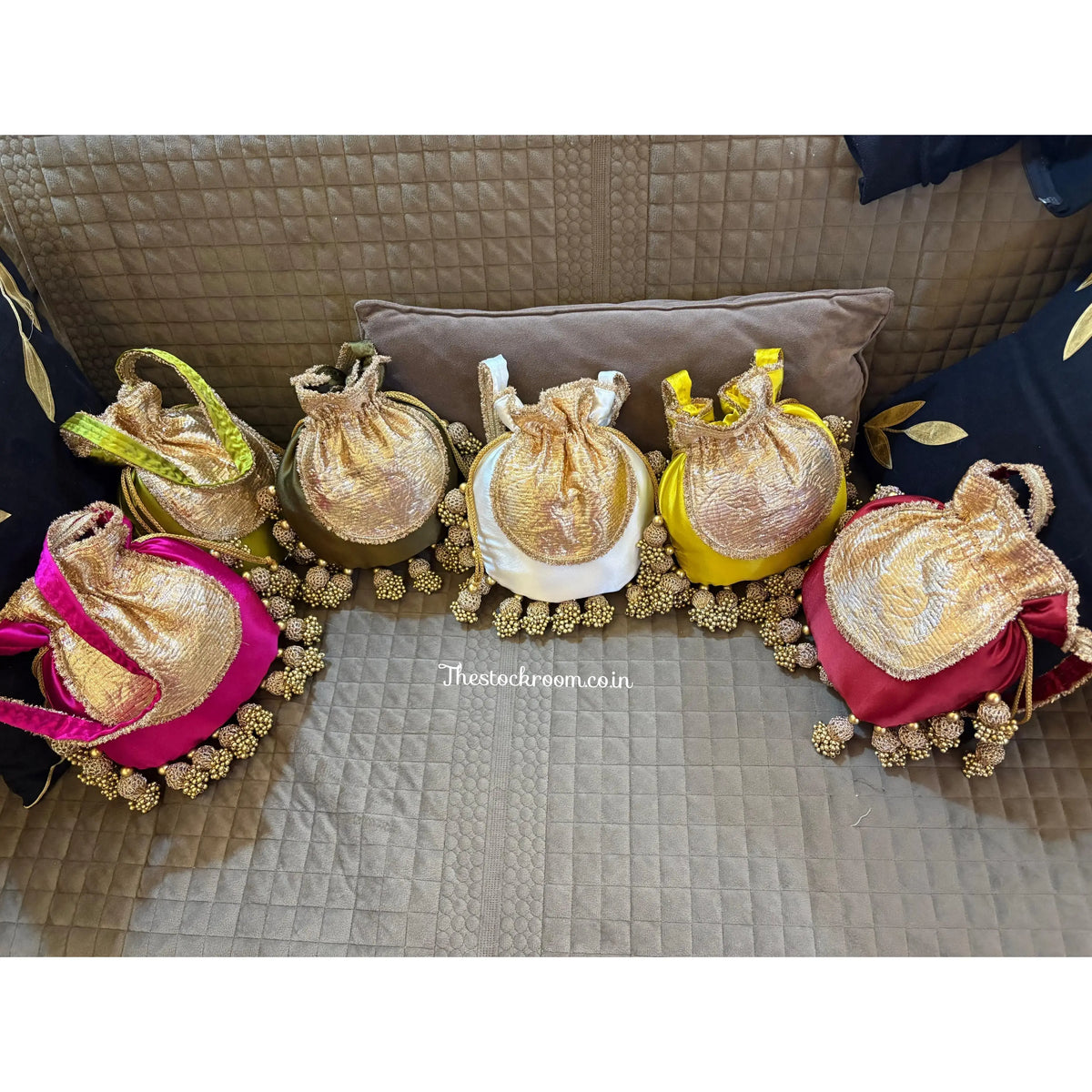 Luxury handcrafted Jhumka potli with moti tassels