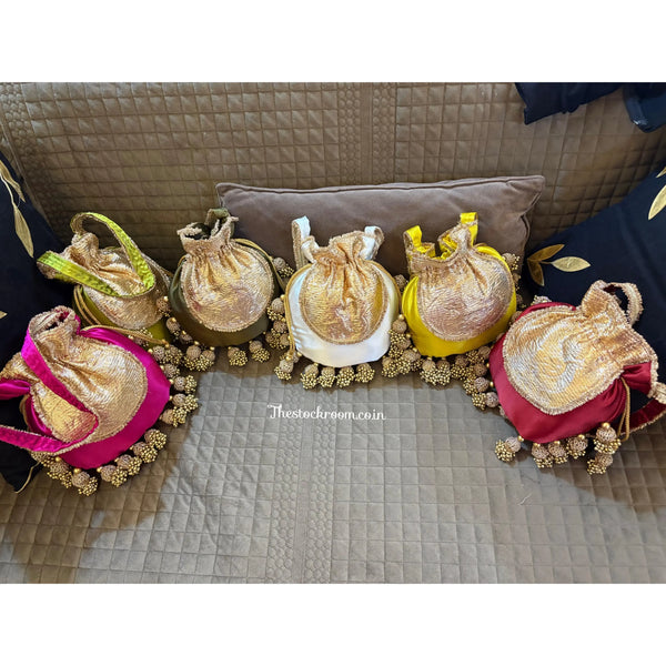 Luxury handcrafted Jhumka potli with moti tassels