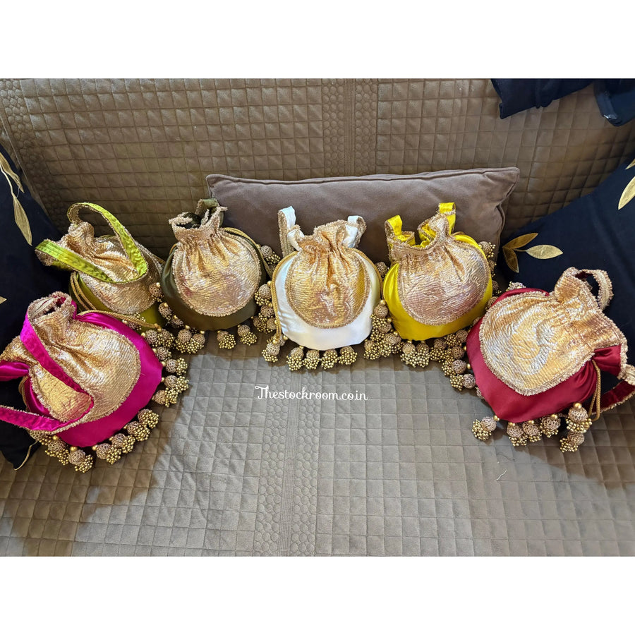 Luxury handcrafted Jhumka potli with moti tassels